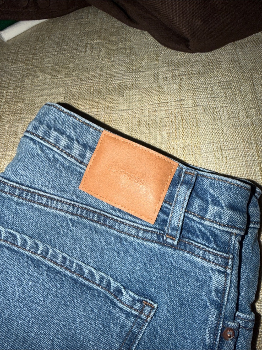 Express Women’s Blue Denim Jeans with Tan Leather Patch